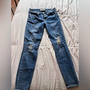 Gap true skinny, destressed jeans with gold detail.